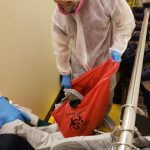 DAI Restore Team Members Performing Biohazard Cleanup in a Commercial Property