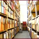 rows of files and books in facility