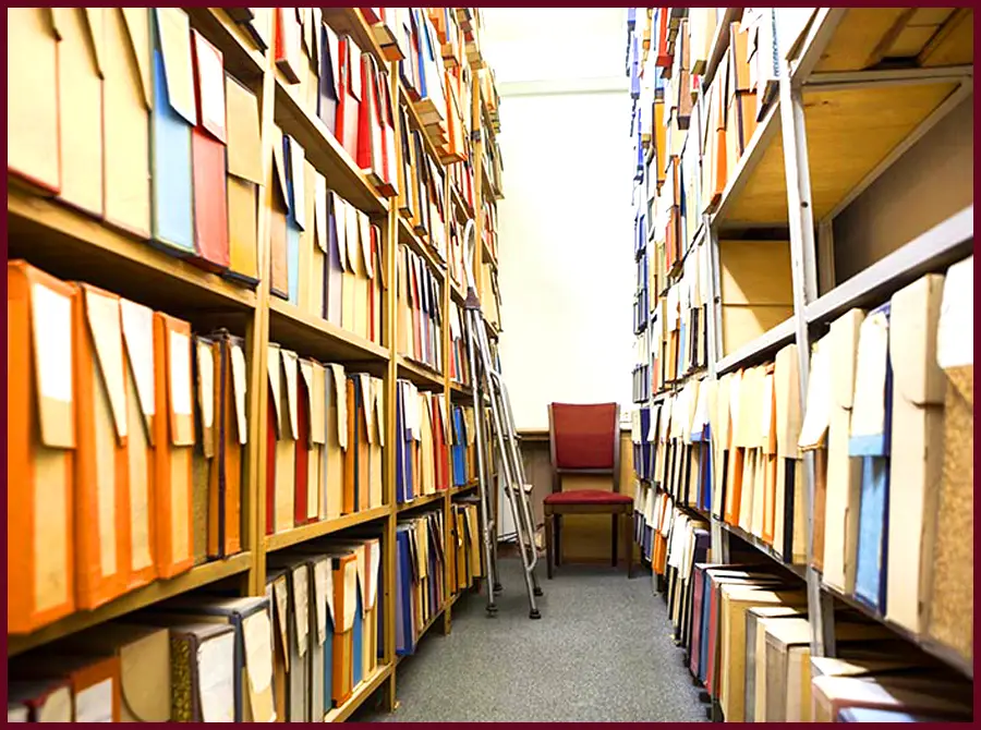 rows of files and books in facility