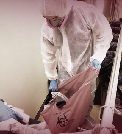DAI Team Member Working on a Biohazard Cleanup in a Commercial Building