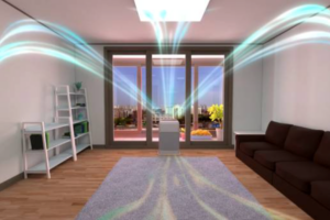 A bright, modern living room with a large window overlooking the city, illuminated by colorful lights