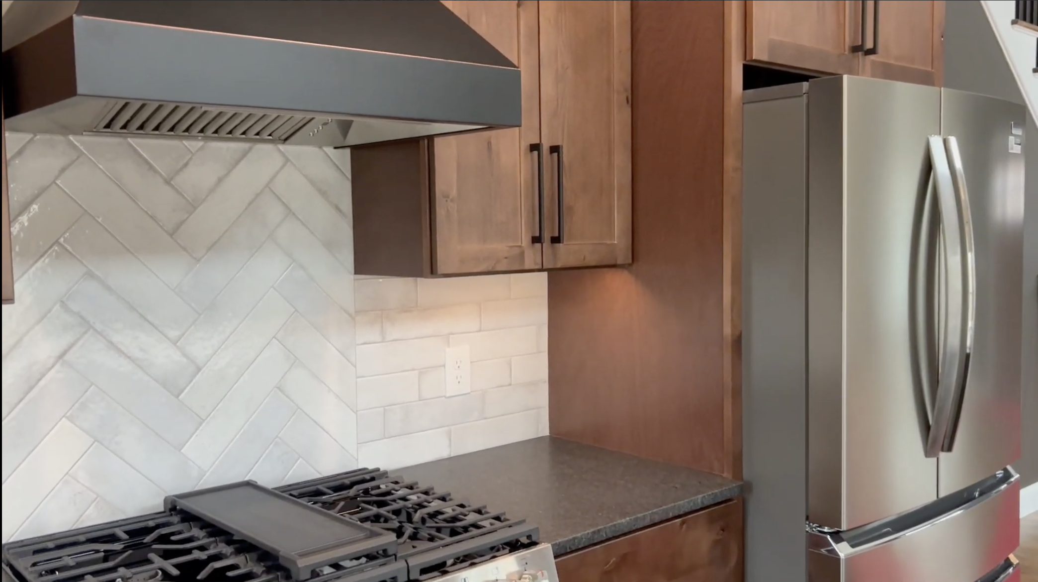 A kitchen in a newly built home that was professionally cleaned by DAI Restore after construction.
